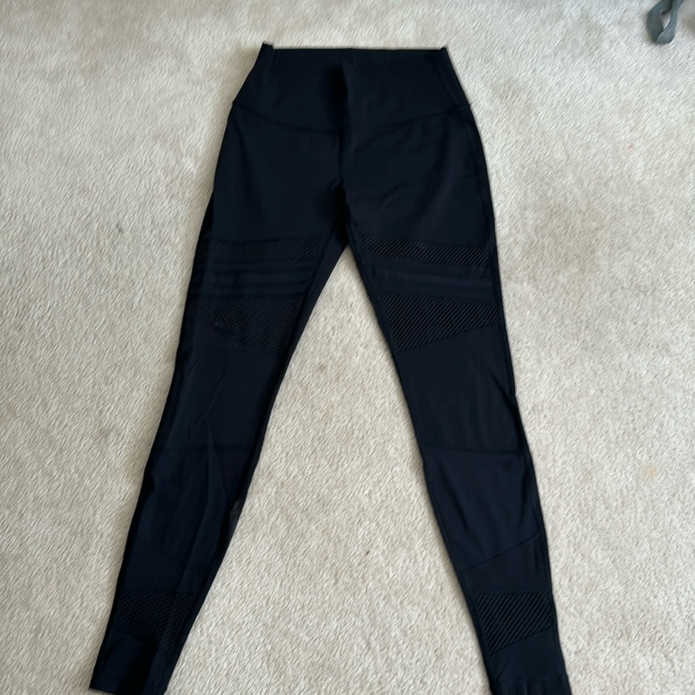 Lululemon size 8 black leggings with mesh detailing